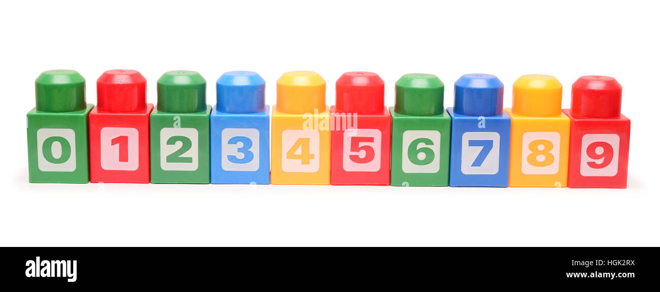 Colorful stacked toy plastic building blocks isolated on white ...