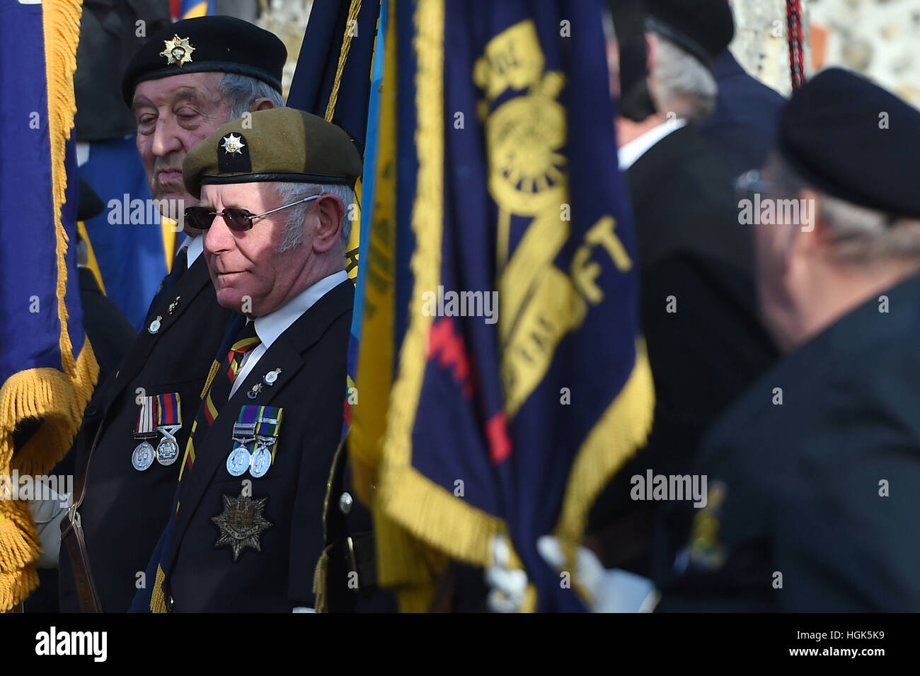 Exservicemen form a guard of honour before the funeral service of