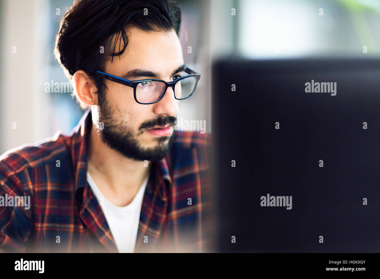 Programmer working at software development company office Stock Photo