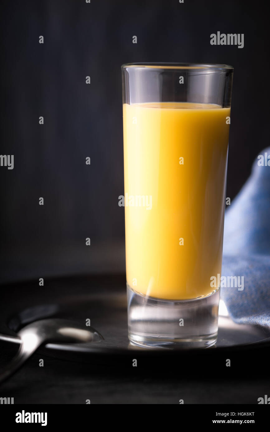 Egg liqueur on the dark background Stock Photo