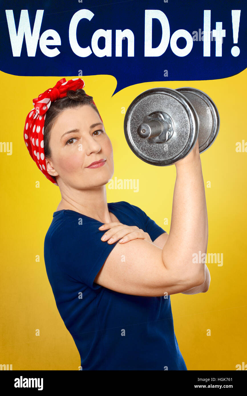 Rosie the Riveter with red kerchief and blue t-shirt lifting a heavy dumbbell, yellow background, WE CAN DO IT speech bubble Stock Photo