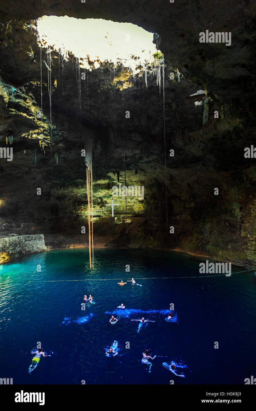 Tourists Swimming In The Ik Kil Cenote Sinkhole Yucatan