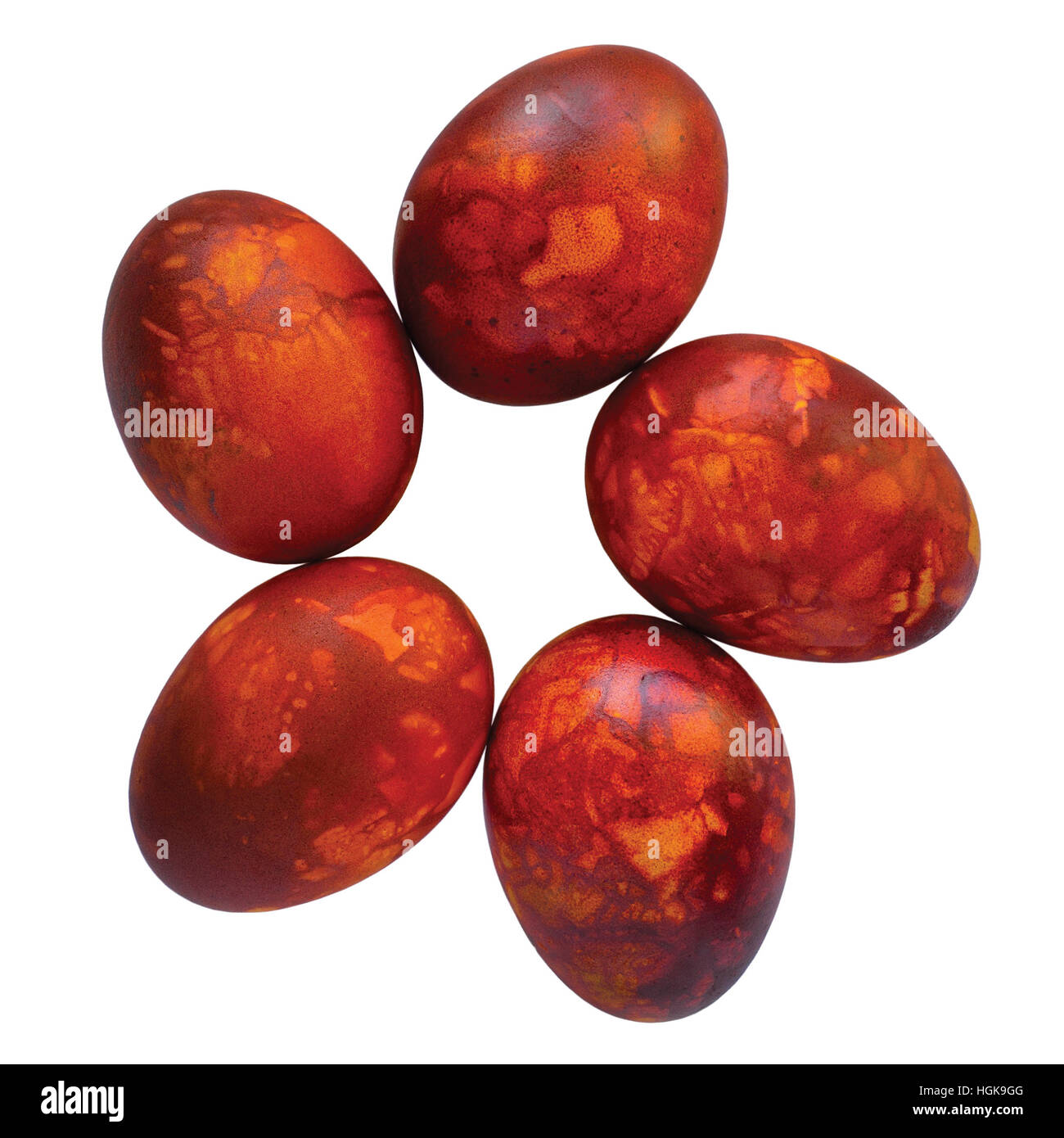 Five traditional red Easter eggs, onions peel colored, painted in onion skins, large detailed isolated rustic vintage macro closeup studio shot Stock Photo