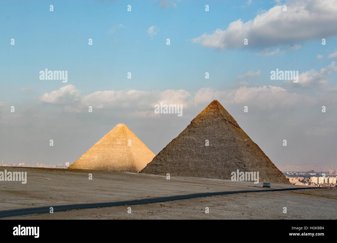 The pyramids of Giza, in southwest part of Cairo, is dominated by the massive pyramids built by 4th dynasty rulers of Egypt. Stock Photo