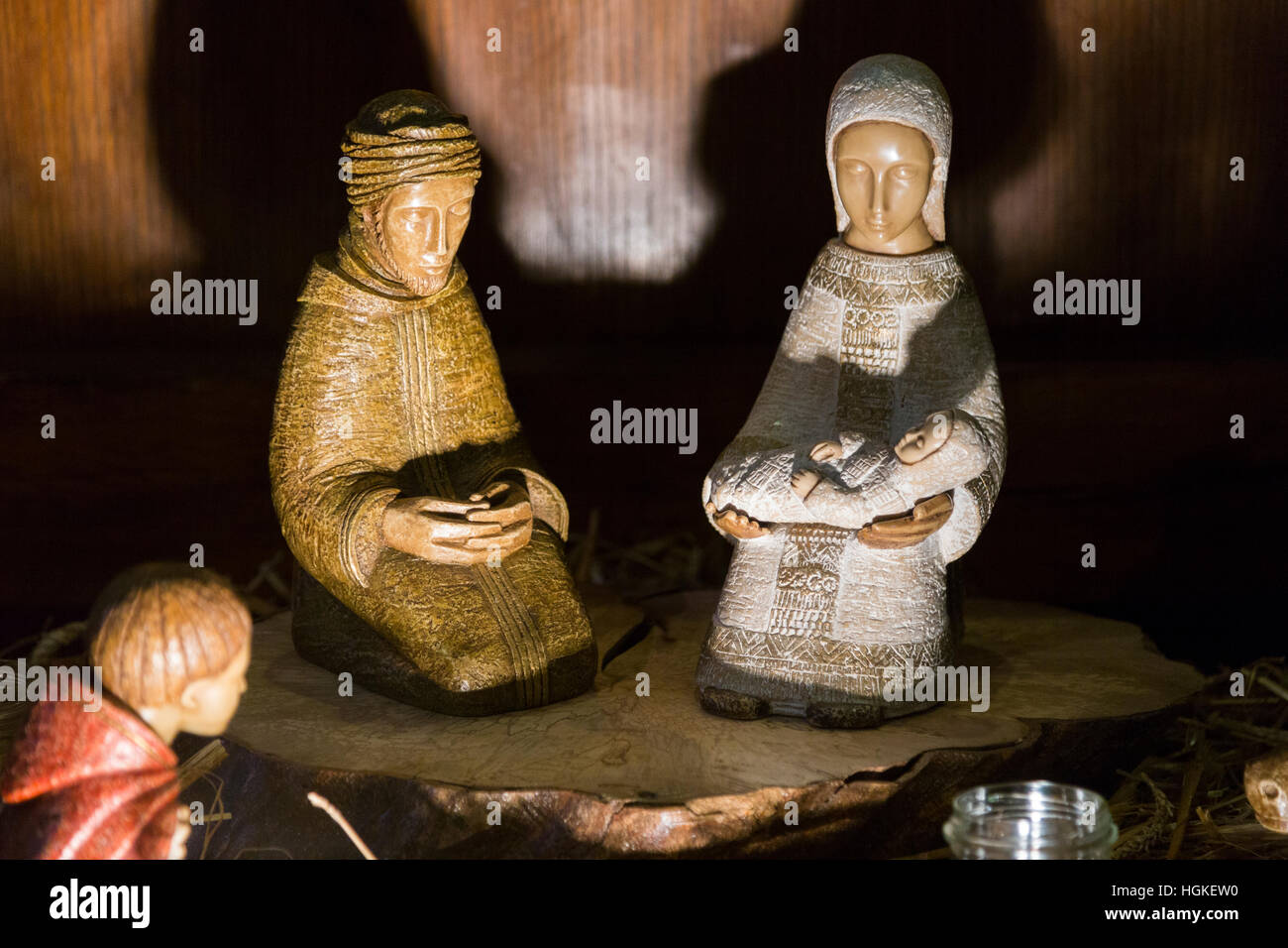 Mary and Joseph and baby Jesus Christ at the centre of a Nativity scene in a French Church in France at Christmas / Xmas. Stock Photo