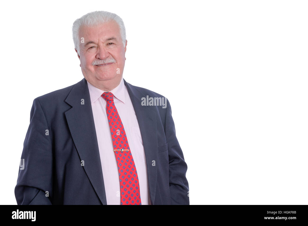 Half body portrait of smiling mature businessman in suit on white background with copy space Stock Photo