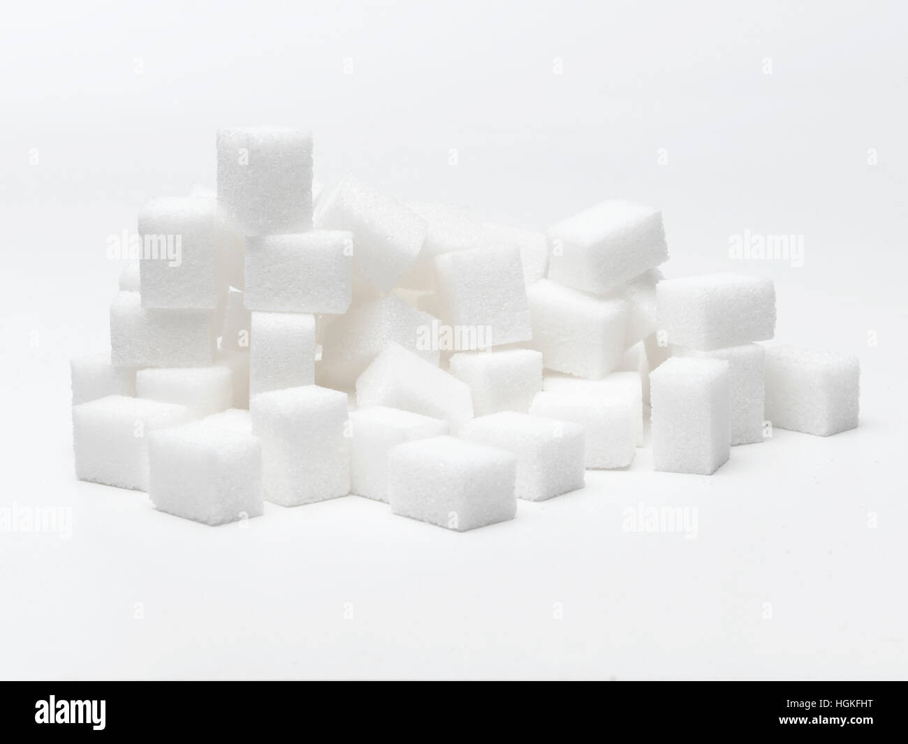 Pile of Sugar Cube's isolated on white Stock Photo - Alamy
