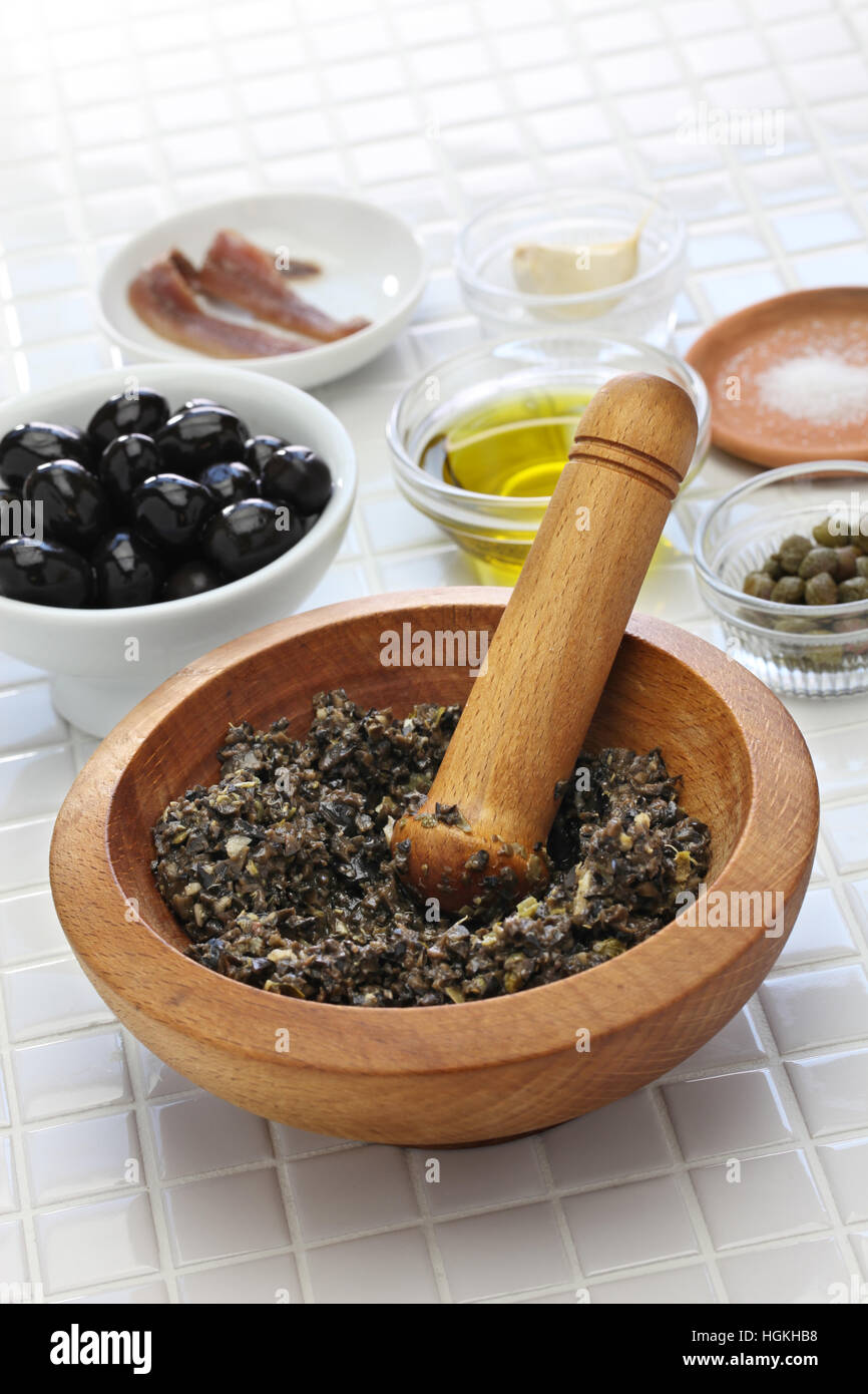 making tapenade, french black olive paste Stock Photo