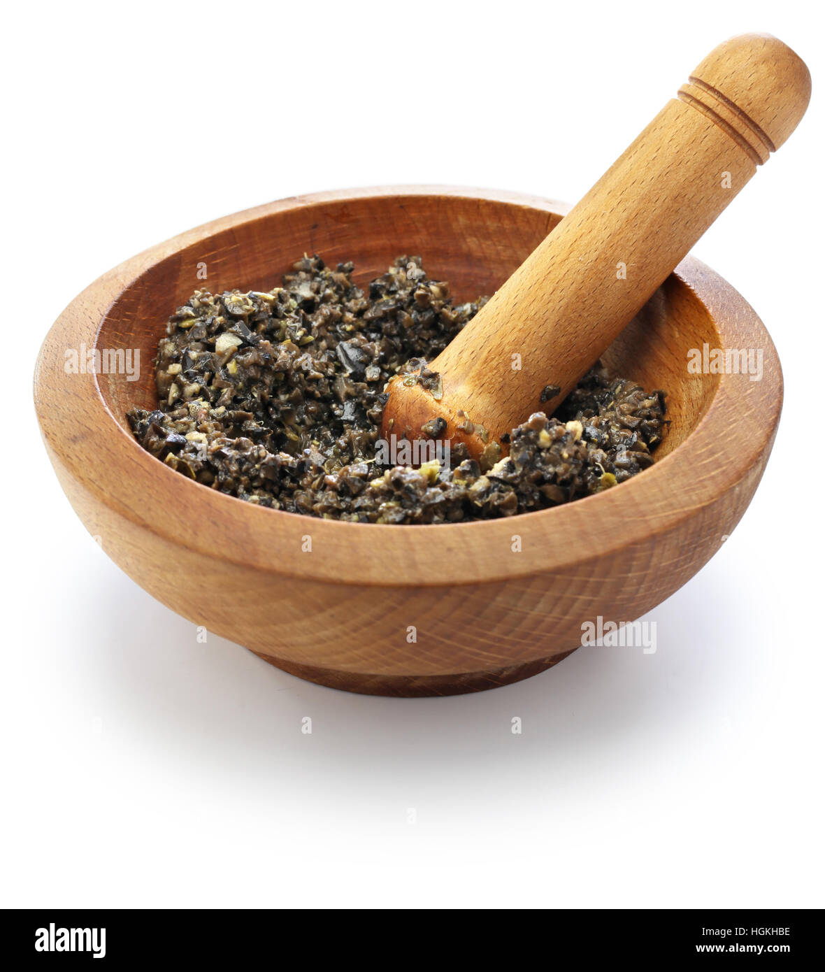 making tapenade, french black olive paste isolated on white background Stock Photo