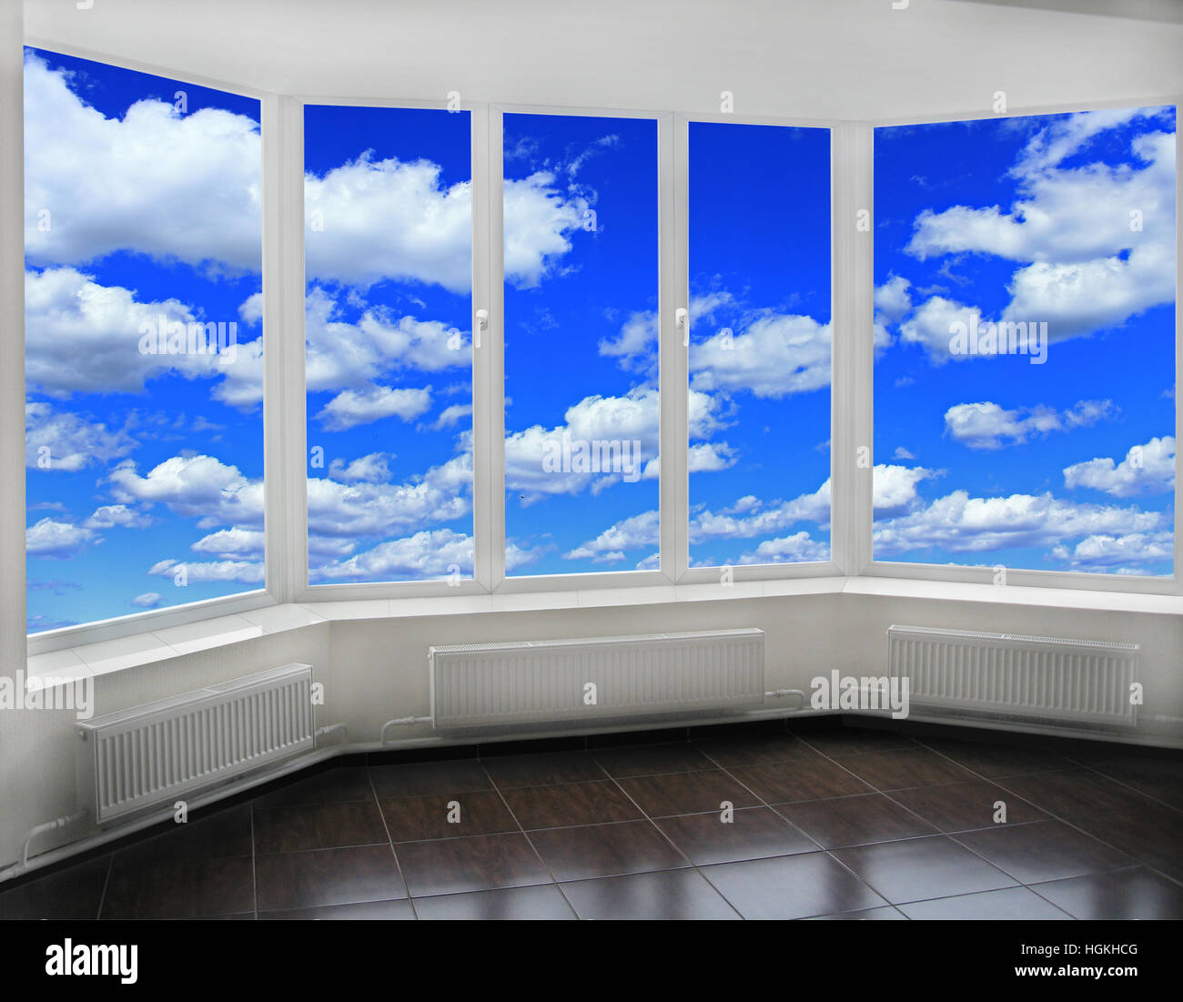 Window Design Overlooking Interior of modern room with plastic windows overlooking the blue ...