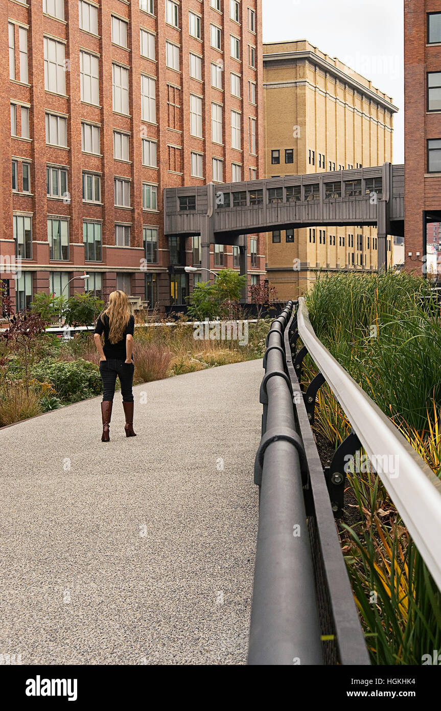 A woman walking on the High Line in New York city Stock Photo - Alamy