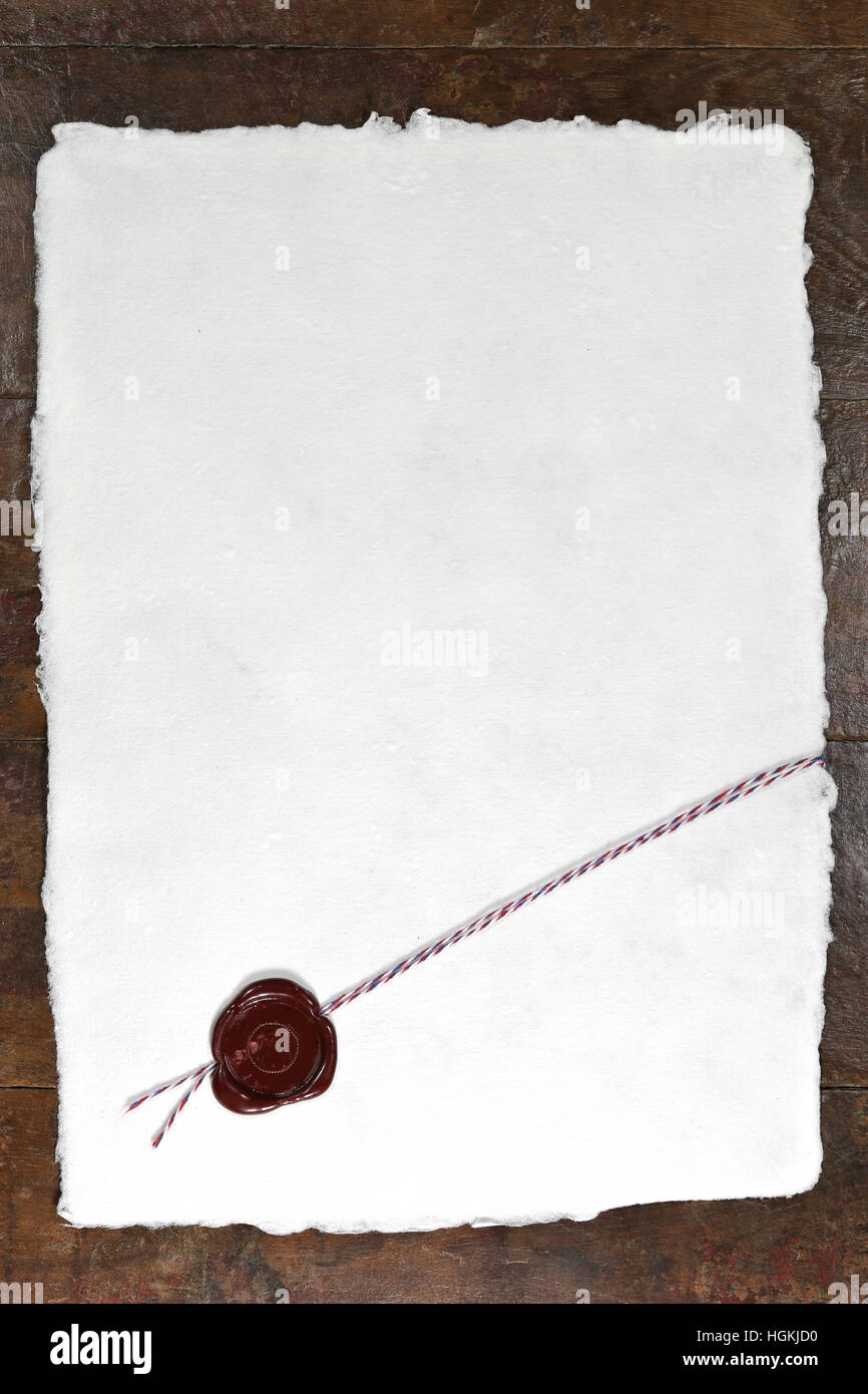 Download Handmade Paper With Wax Seal On Wooden Table Stock Photo Alamy Yellowimages Mockups