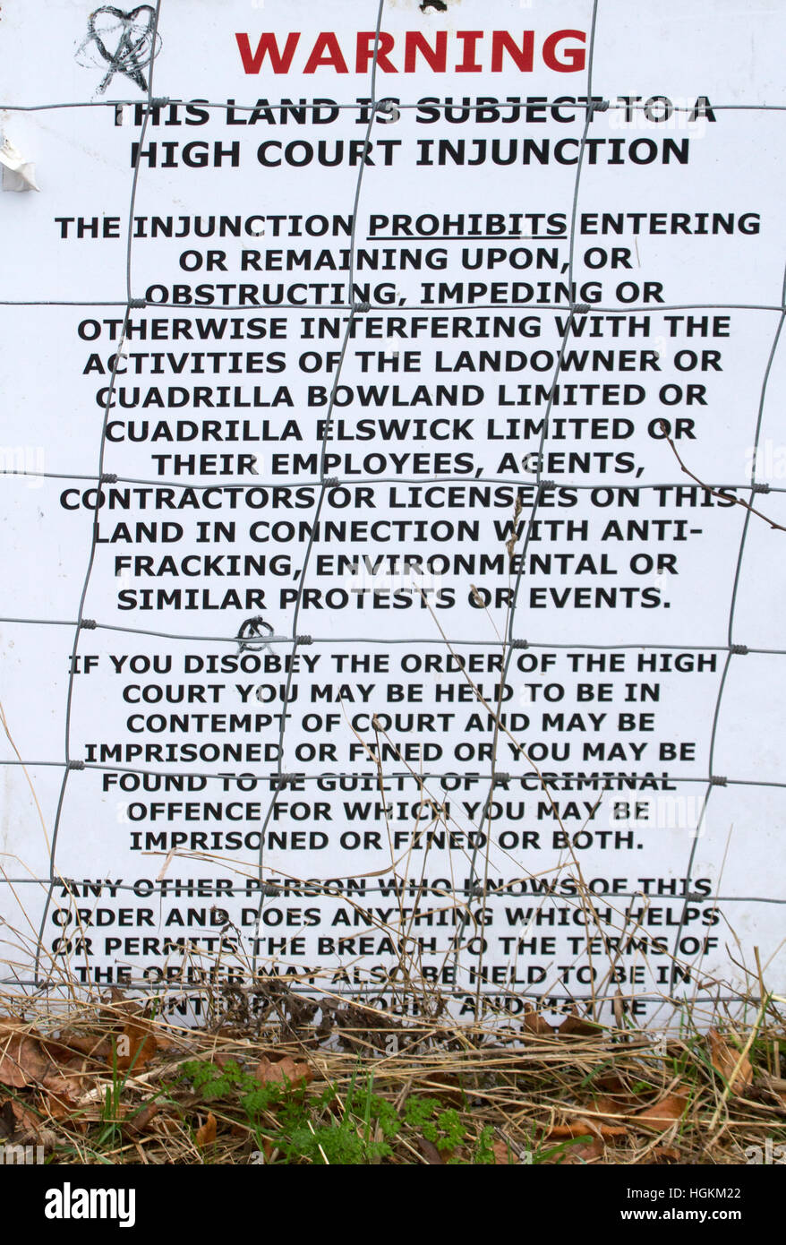 Warning signs about High Court Injunction at the Cuadrilla fracking site at Little Plumpton in Lancashire, UK. Stock Photo