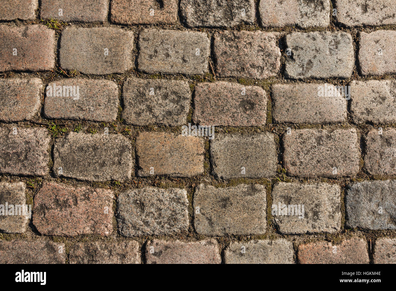 Old cobbled street in Europe. Usable as pattern or background. Stock Photo