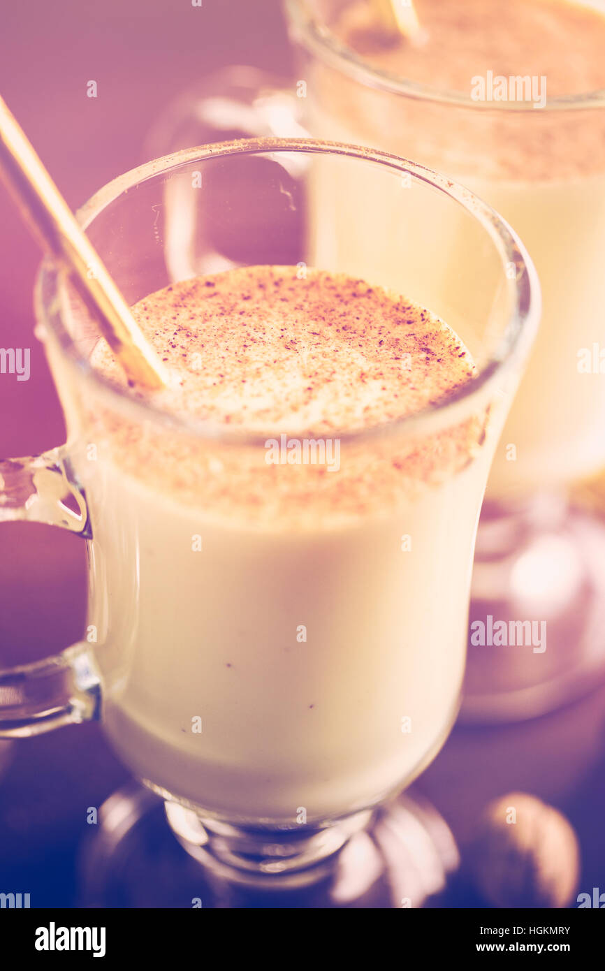 Traditional holiday drink egg nog garnished with nutmeg Stock Photo Alamy