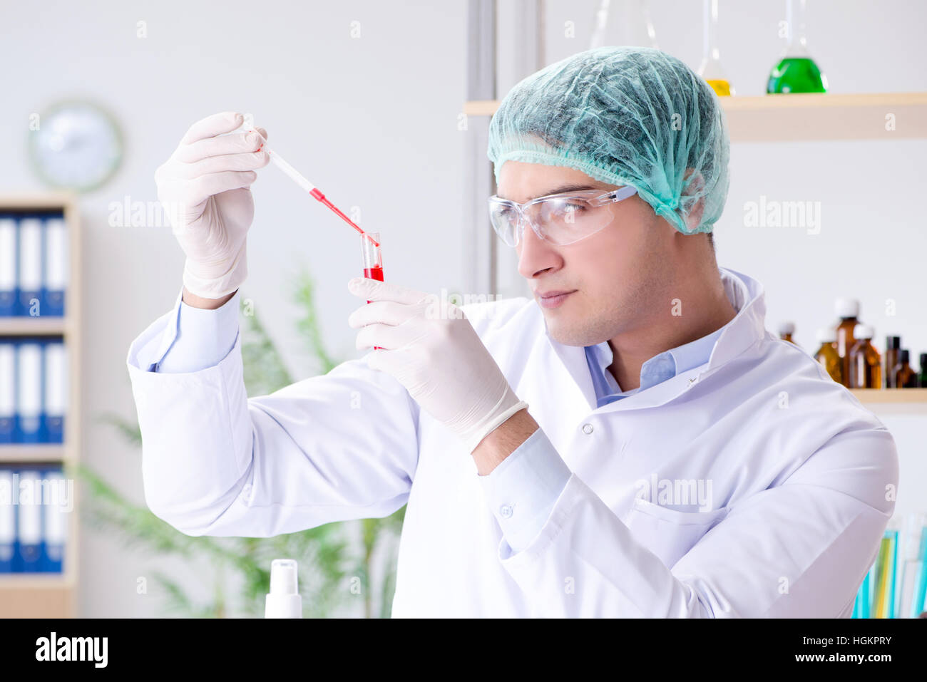 Blood testing in the lab with young scientist Stock Photo Alamy