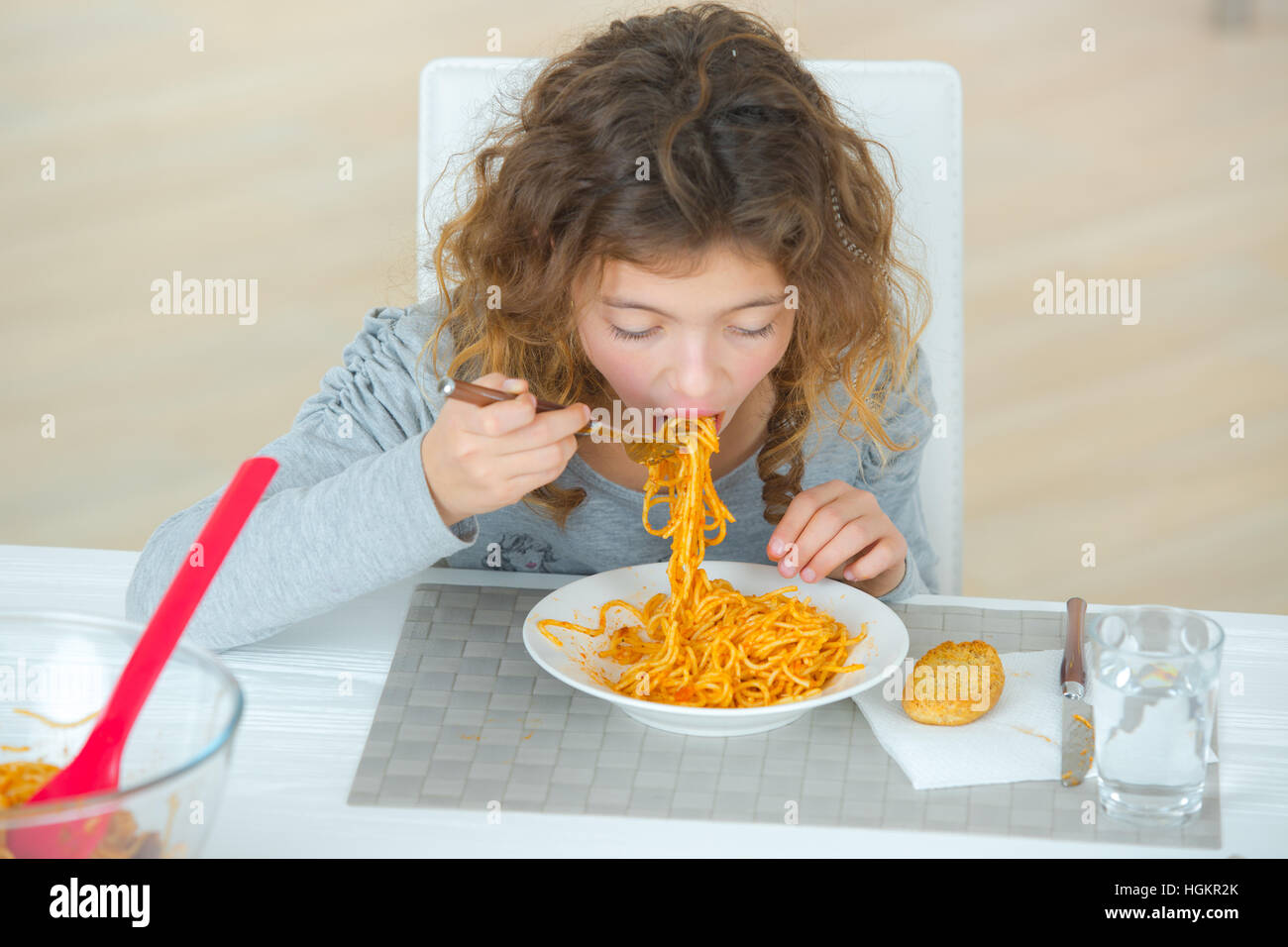 kid eating spaghetti Stock Photo Alamy