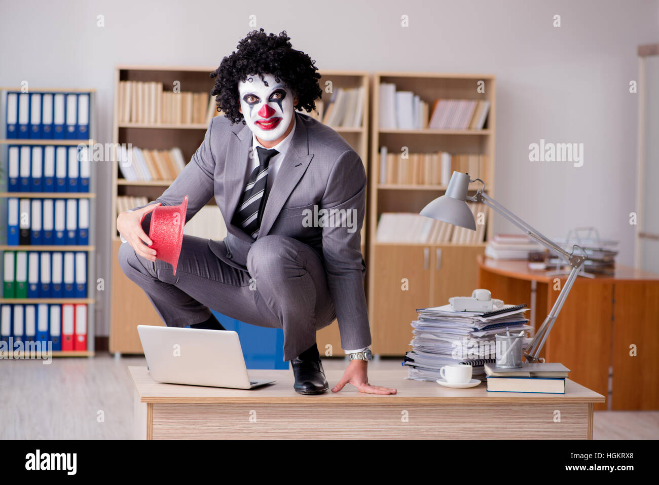 Work Cloan Clown businessman working in the office Stock Photo - Alamy