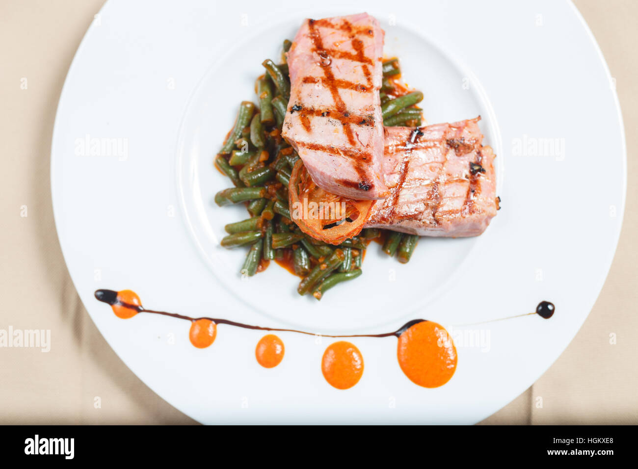 Grilled tuna on a vegetable bed Stock Photo Alamy
