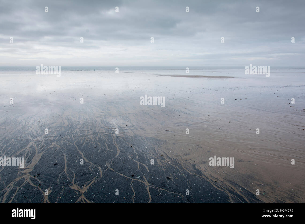 Moody atmospheric  scene on Aberavon beach, South Wales, UK, looking from land out to sea. Stock Photo