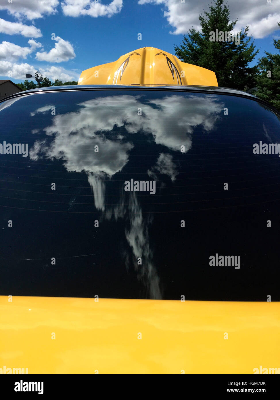 A yellow car with raised hood Stock Photo Alamy