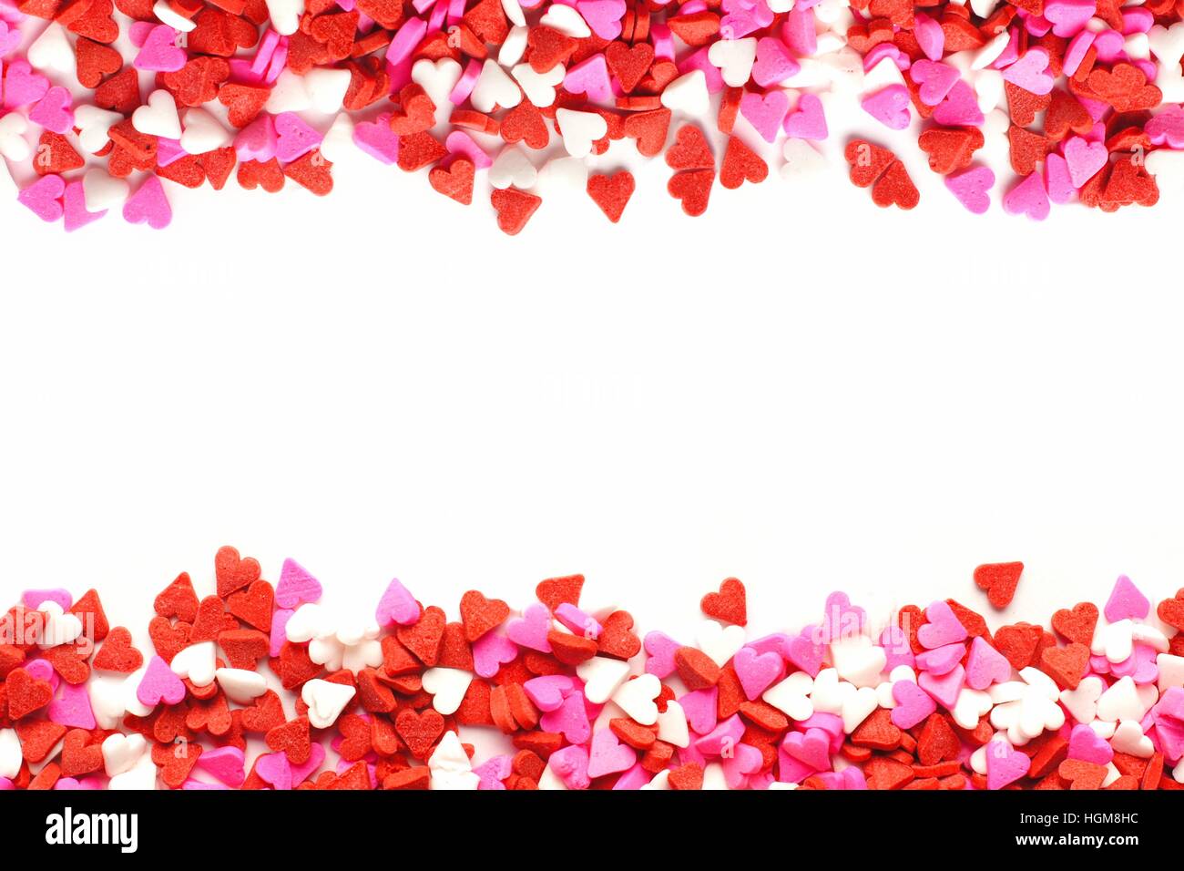 Valentines Day cinnamon hearts background or border over white Stock Photo  - Alamy