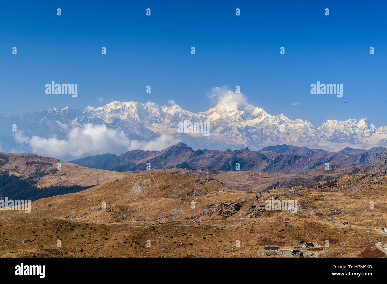 Kanchenjunga, is the third highest mountain in the world, and lies partly in Nepal and partly in Sikkim, India. Stock Photo