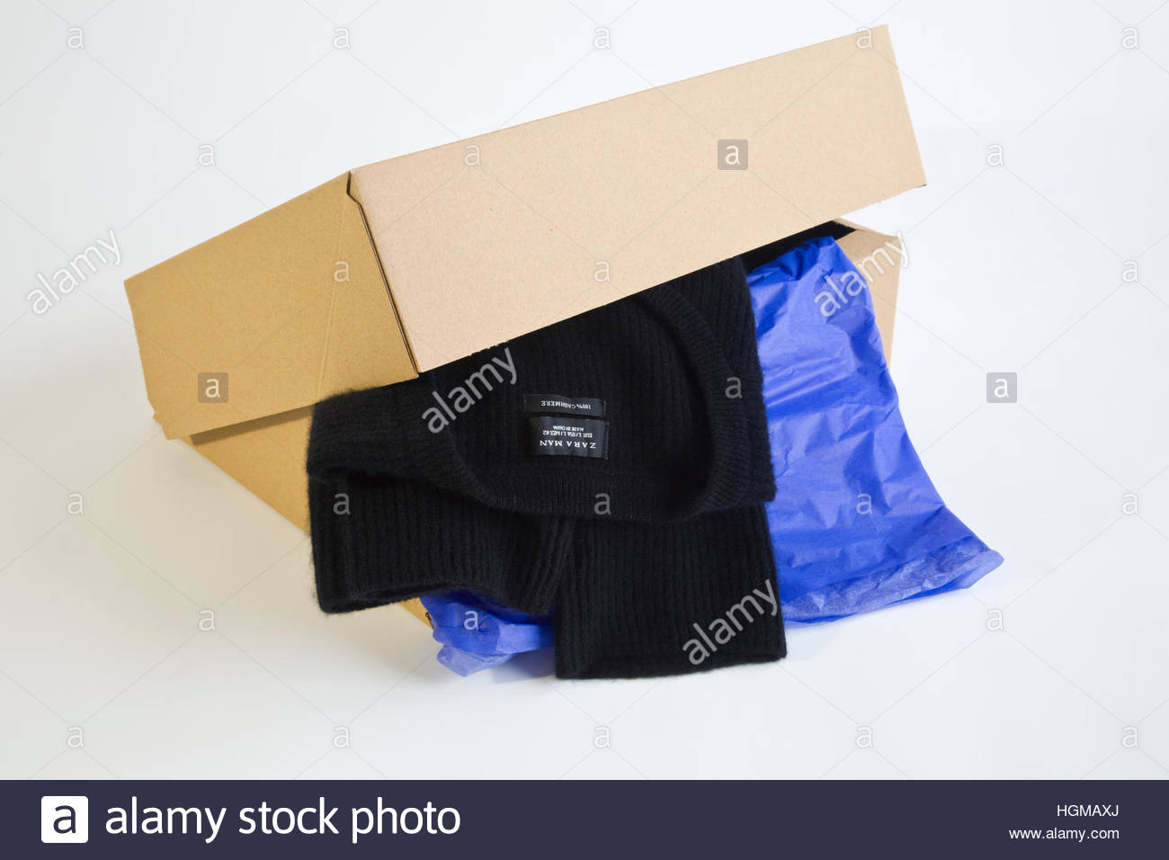 Packaging and black cashmere pullover for Zara on-line shopping Stock Photo  - Alamy