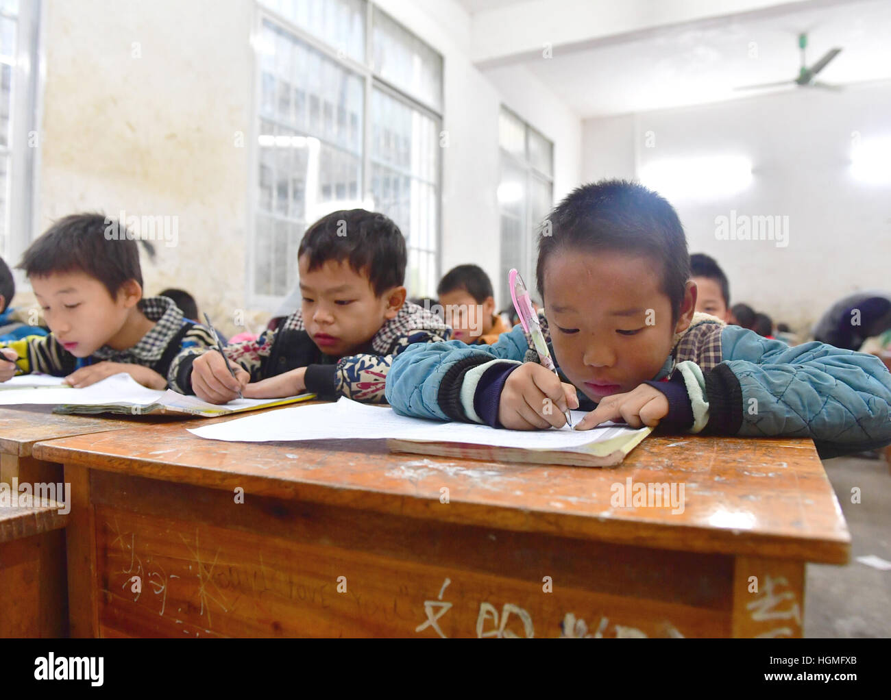 Guangxi, China. 11th Jan, 2017. The third-grade students from Nongyong ...