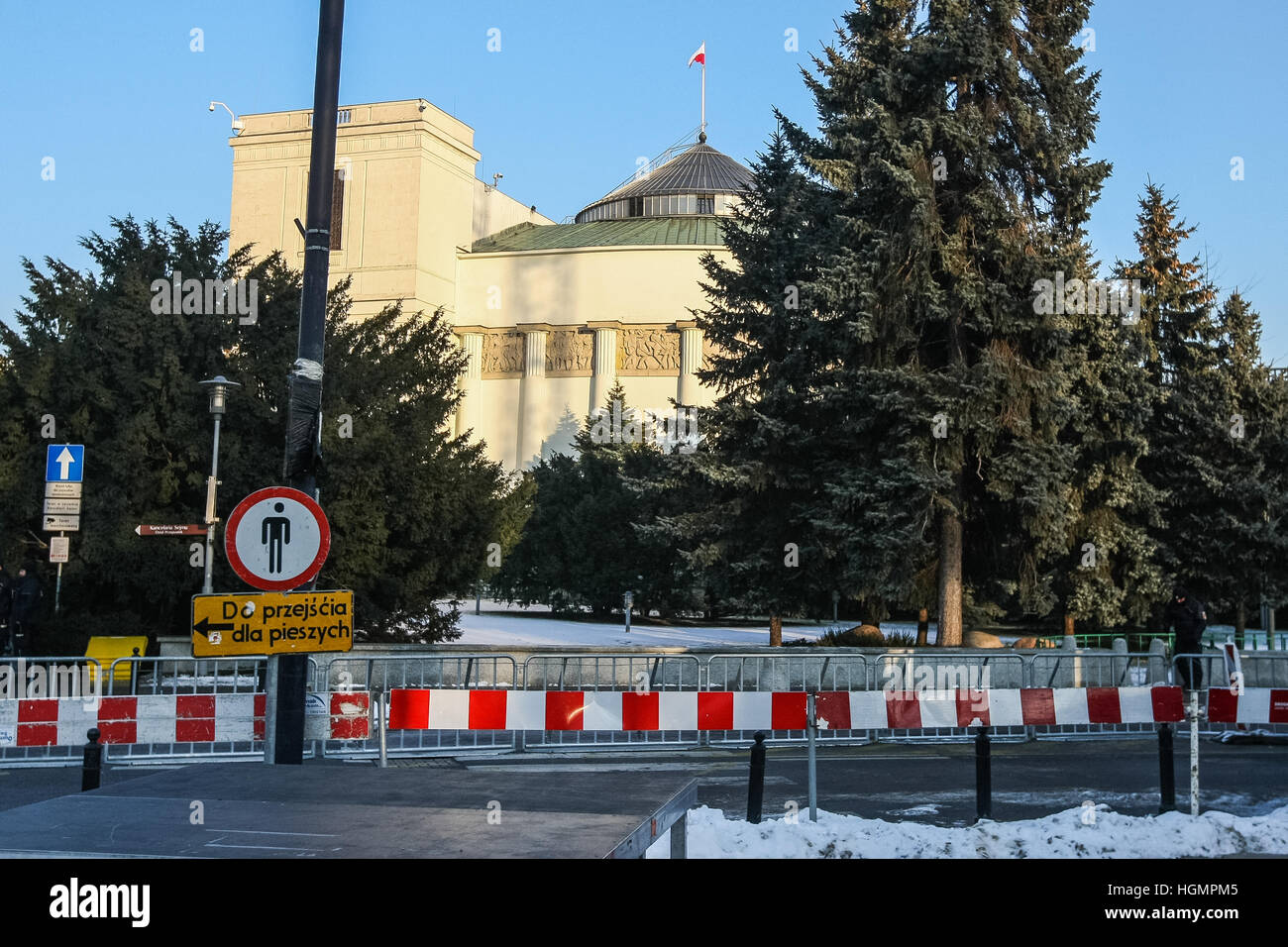 Warsaw, Poland 11th, Jan. 2017  Fenced and guarded by strong police forces Polish Parliament building is seen.  Committee for Defence of Democracy (KOD) protest outside the Polish Parliament (Sejm). Protesters demand to respect Polish Law by the PiS ruling party Parliament Members and government during the disputed budget bill. Credit: Michal Fludra/Alamy Live News Stock Photo