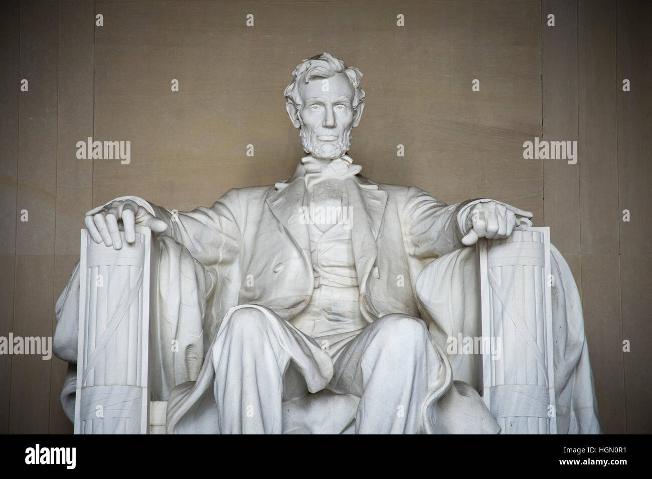 Iconic statue of Abraham Lincoln, sculpted by Daniel Chester French, is in the Lincoln Memorial in Washington DC. Stock Photo