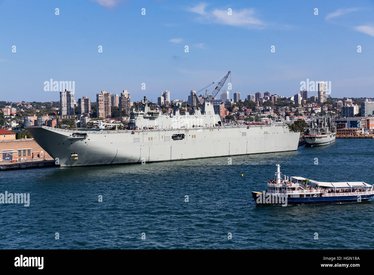 HMAS Adelaide (L01) at Garden Island Naval Dockyard in Sydney Harbour Stock Photo