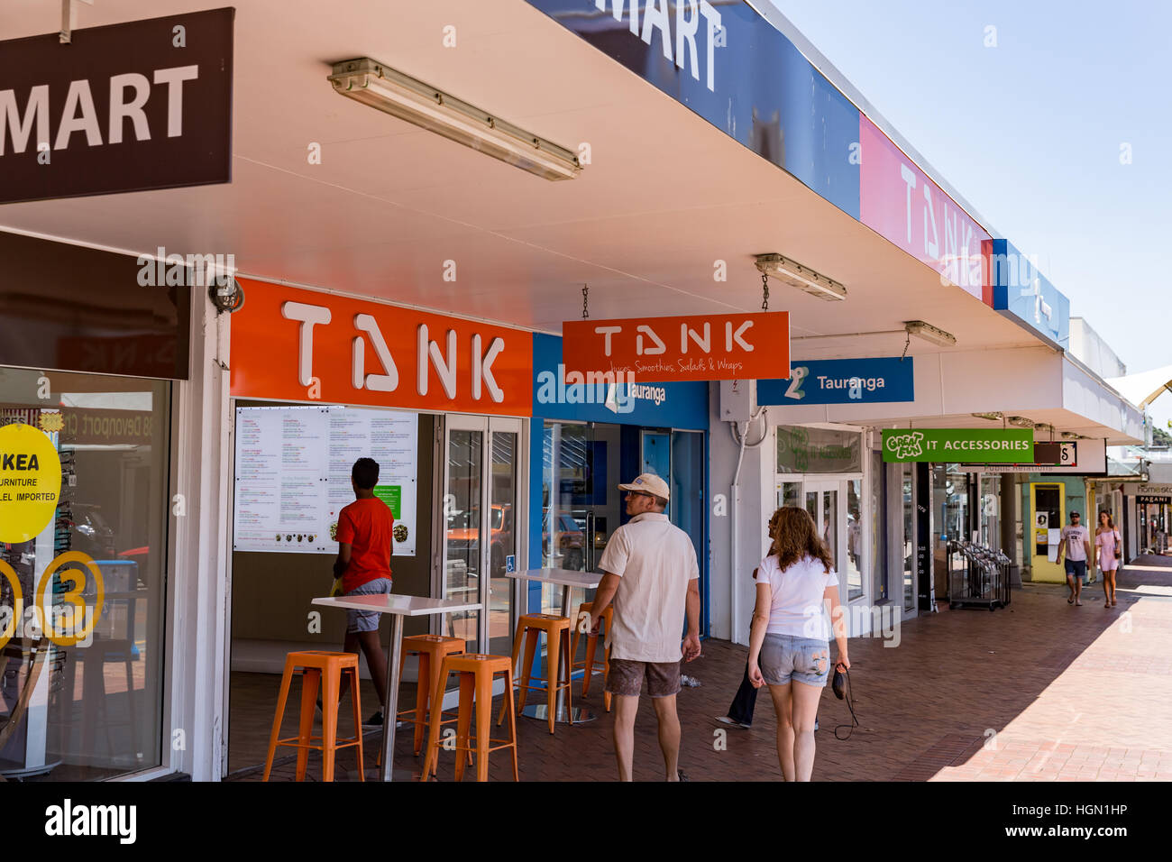 Shoppers in main shopping street in Tauranga, New Zealand Stock Photo