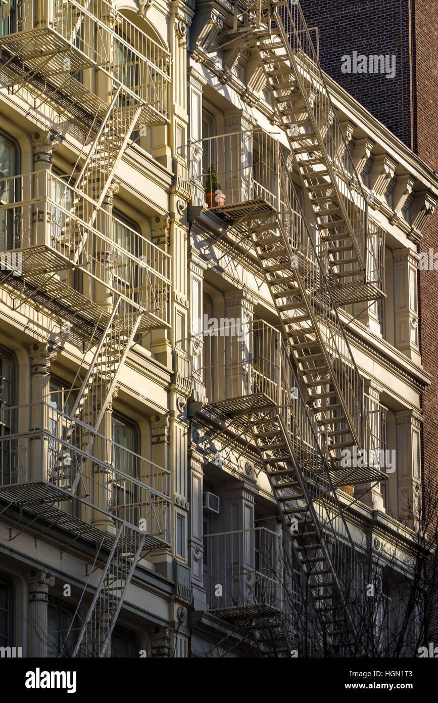 Soho building facades with fire escapes. Manhattan, New York City Stock Photo