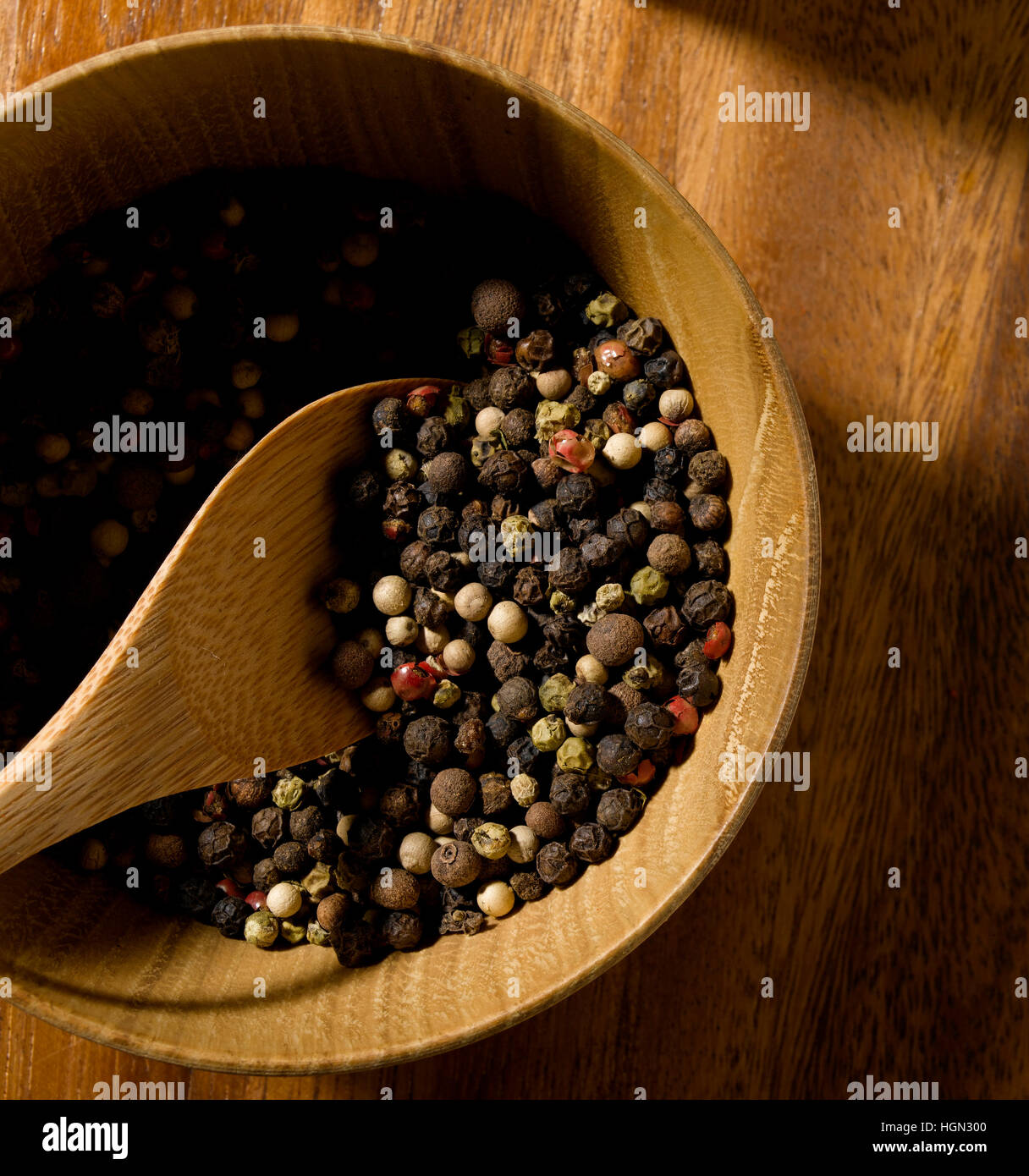 Mixed Peppercorns on tabletop Stock Photo