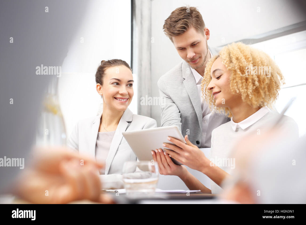 Training company, a group of employees. Corporate business meeting. Office work. Business consultants while working in a team. Stock Photo