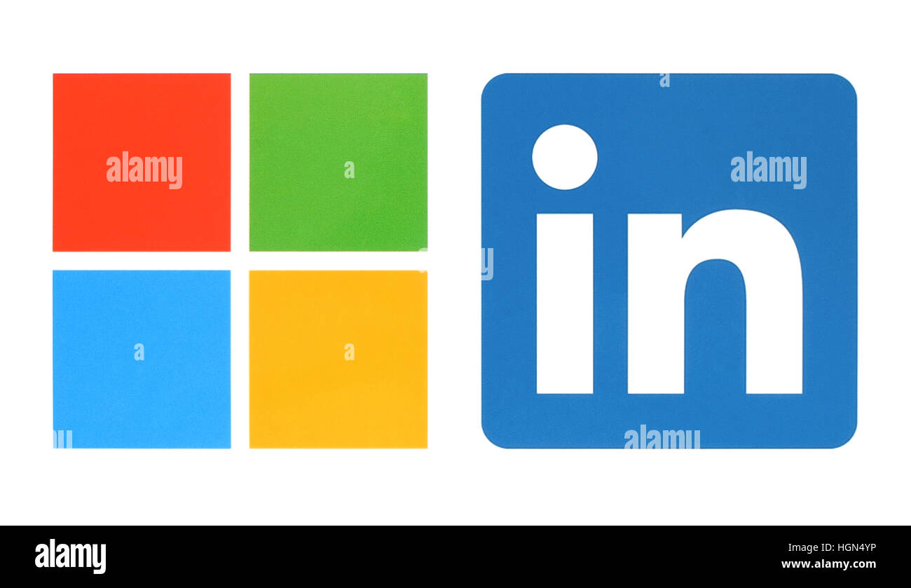 Kiev, Ukraine - June 13, 2015: Microsoft and Linkedin logos printed on white paper. Microsoft buys Linkedin social media. Stock Photo
