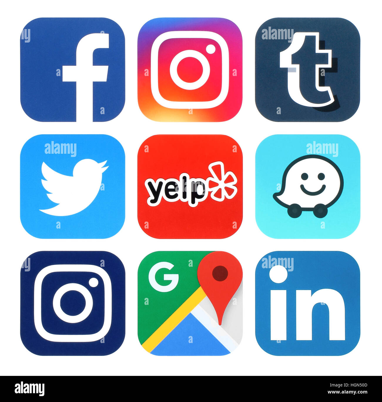 Kiev, Ukraine - July 25, 2016: Collection of popular social media, travel and navigation logos printed on paper:Facebook, Twitter, Instagram, Yelp, Go Stock Photo