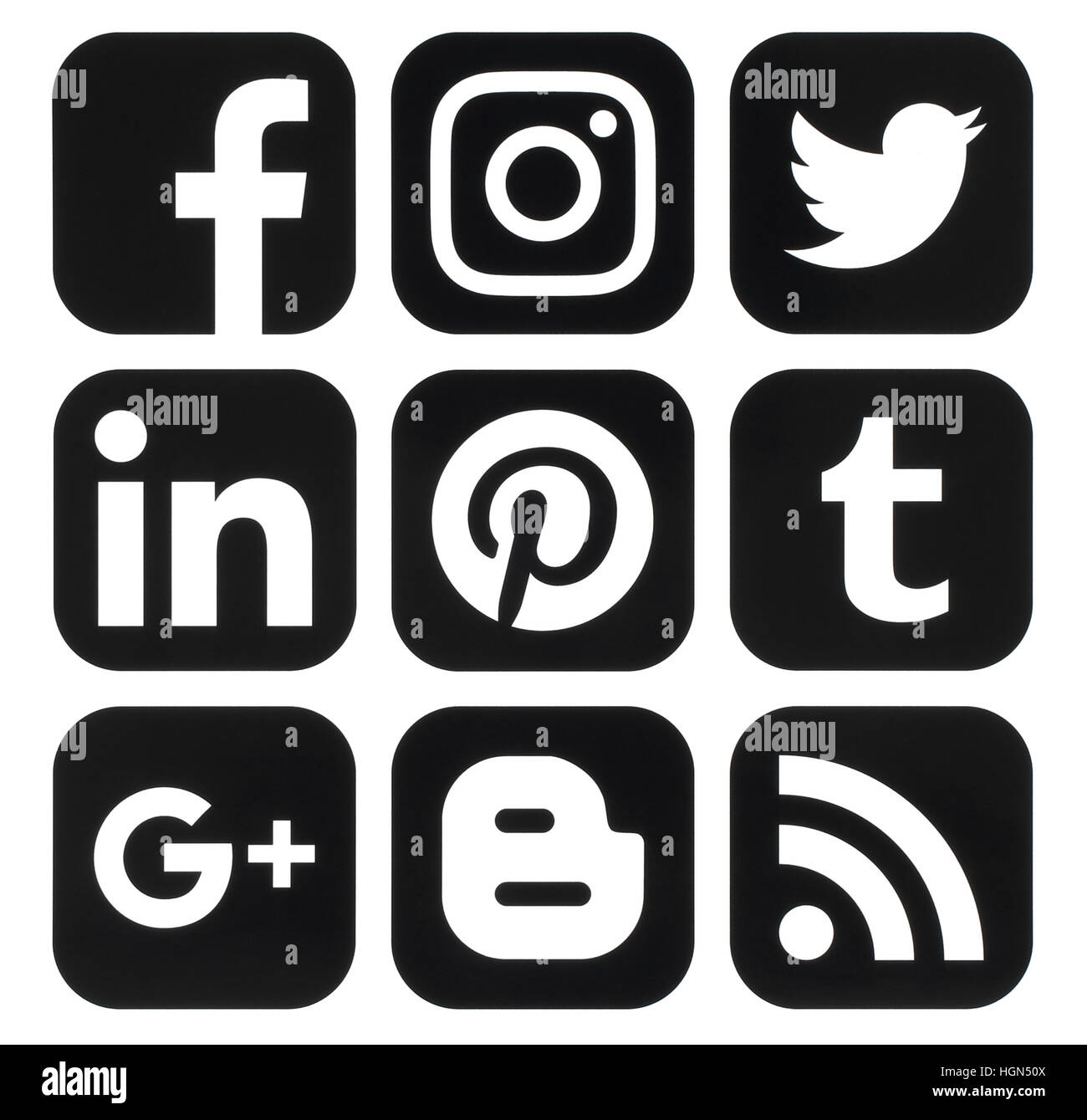 Kiev, Ukraine - August 09, 2016: Collection of popular black social media logos printed on paper: Facebook, Twitter, Google Plus, Instagram, Pinterest Stock Photo