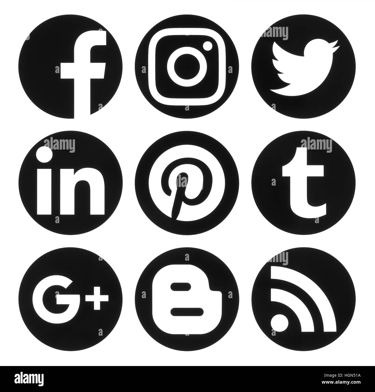 Kiev, Ukraine - September 06, 2016: Collection of popular circle black social media logos printed on paper:Facebook, Twitter, Google Plus, Instagram,  Stock Photo