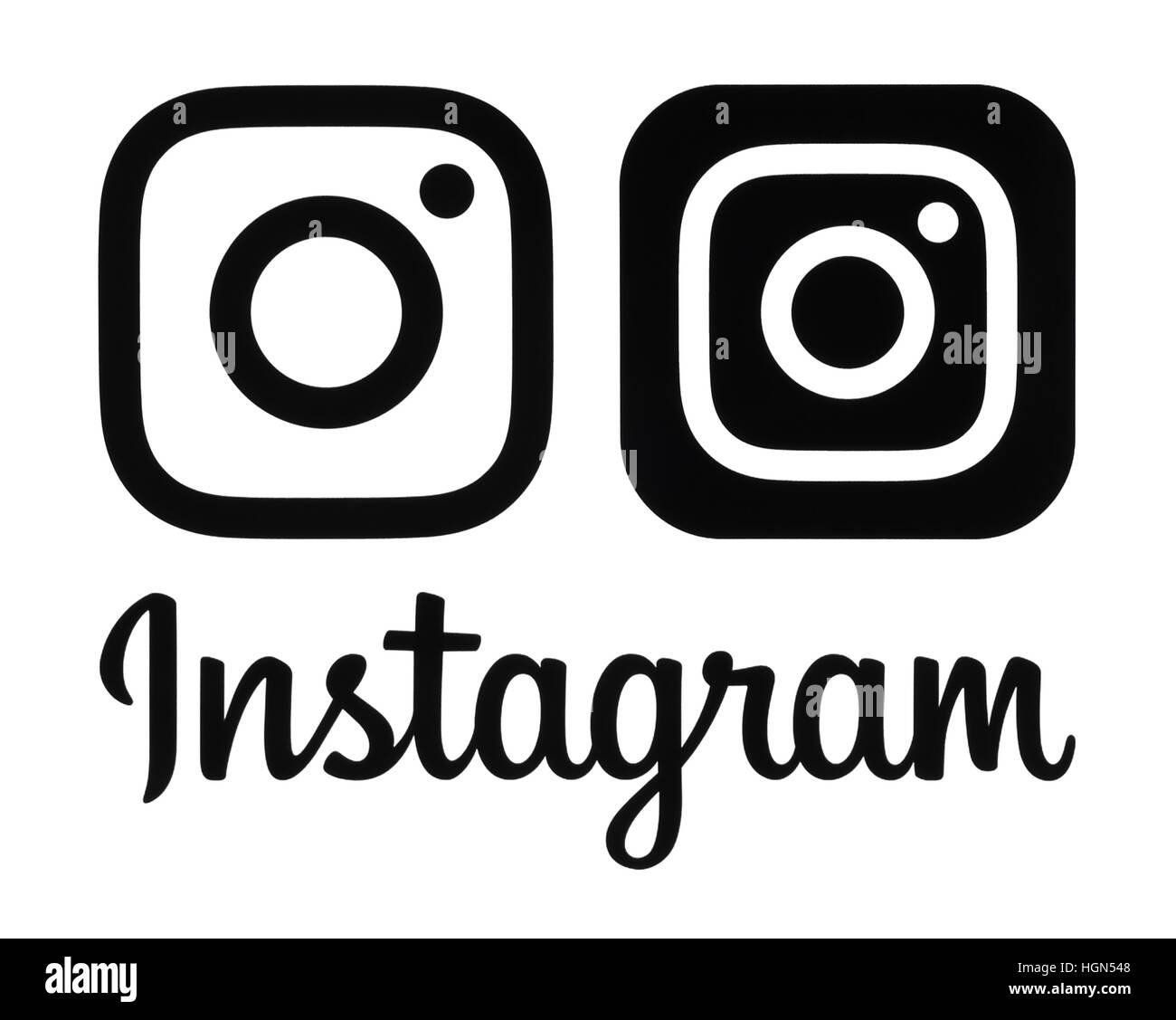 Kiev, Ukraine- November 26, 2016: Black Instagram new logo and icon printed on white paper. Instagram is an online mobile photo-sharing, video-sharing Stock Photo