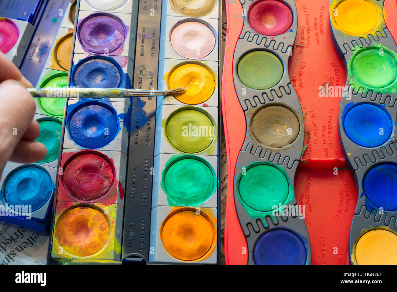 Detail of watercolors for children and brushes Stock Photo - Alamy
