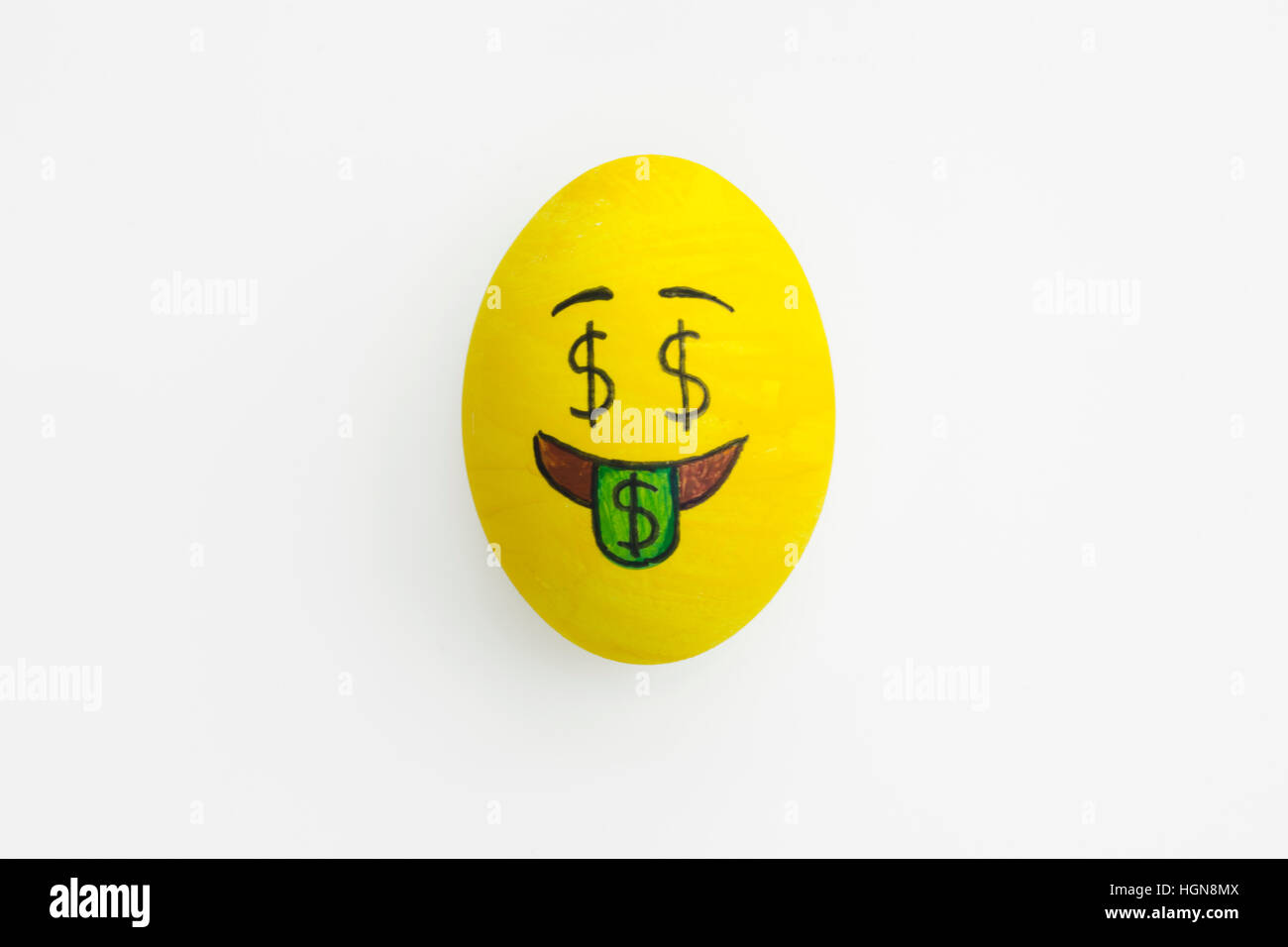 Emoji Easter egg with facial expression 'I love money' in isolated white background. Stock Photo