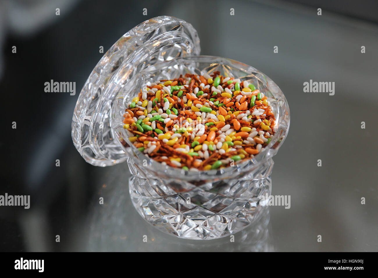 colorful fennel seeds in crystal dish Stock Photo