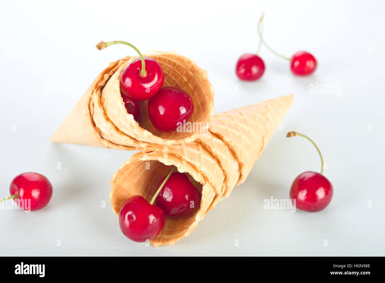 Ice cream cones with cherry fruit Stock Photo