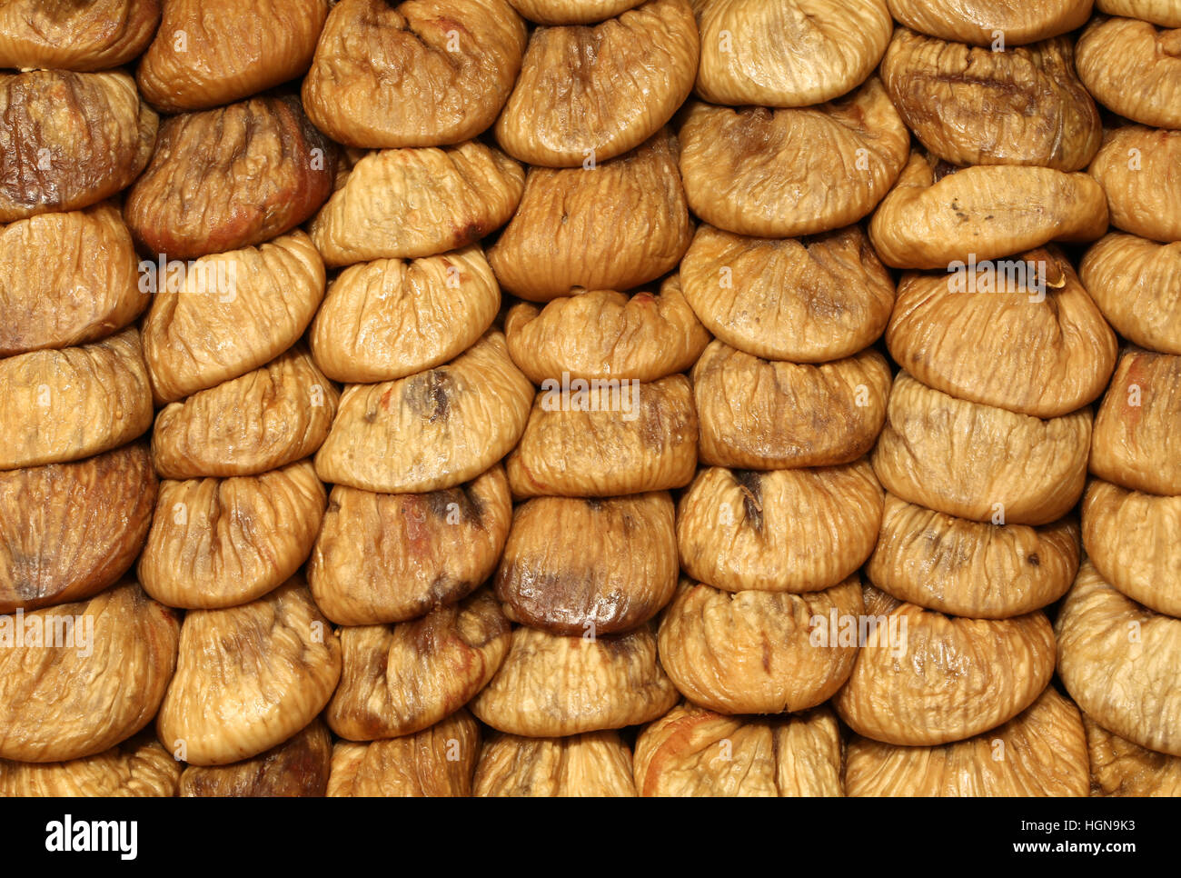 Whole dried figs for sale in the stand of typical products Stock Photo