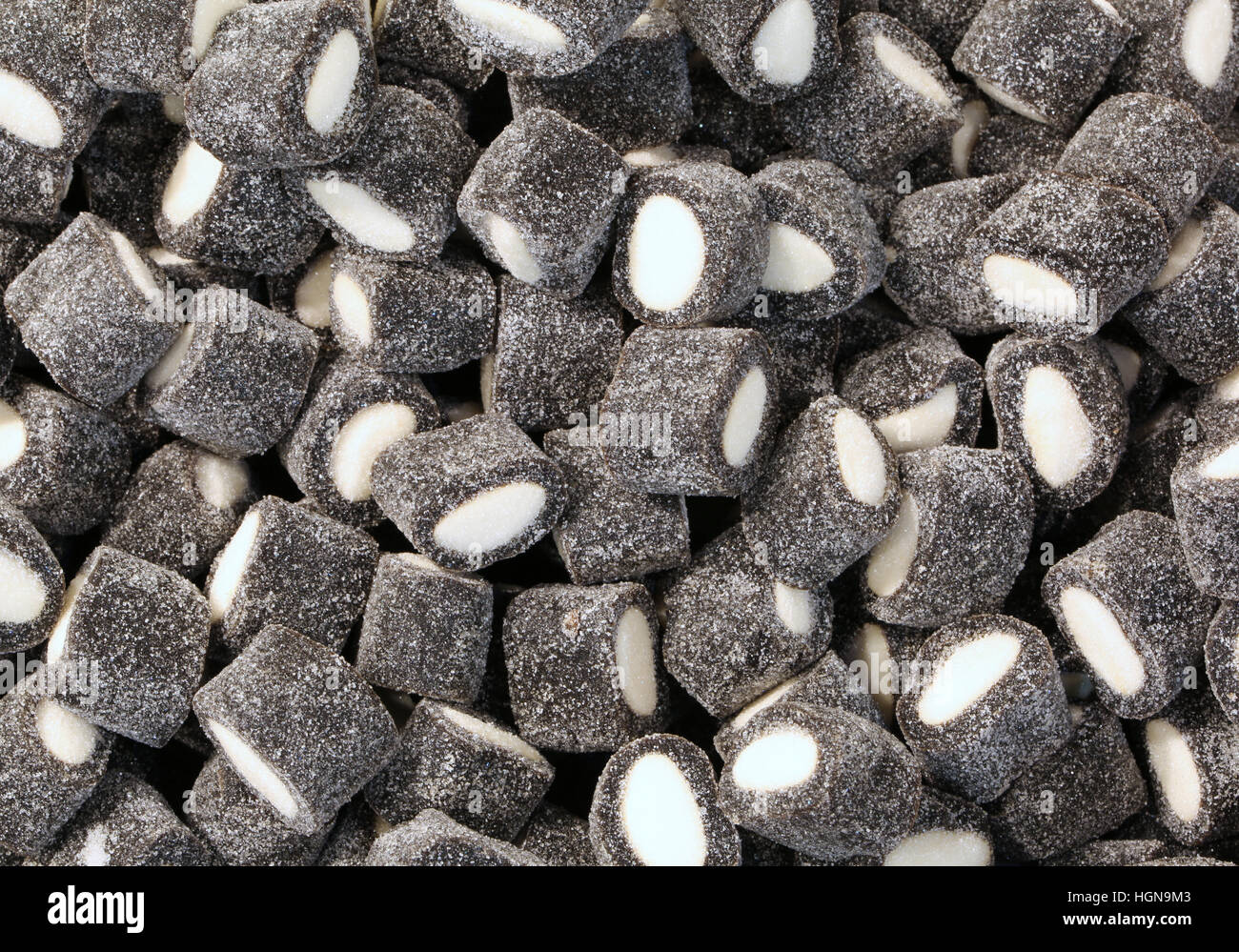 Black Pieces Liquorice Candy Background Hi res Stock Photography And black-pieces-liquorice-candy-background-hi-res-stock-photography-and