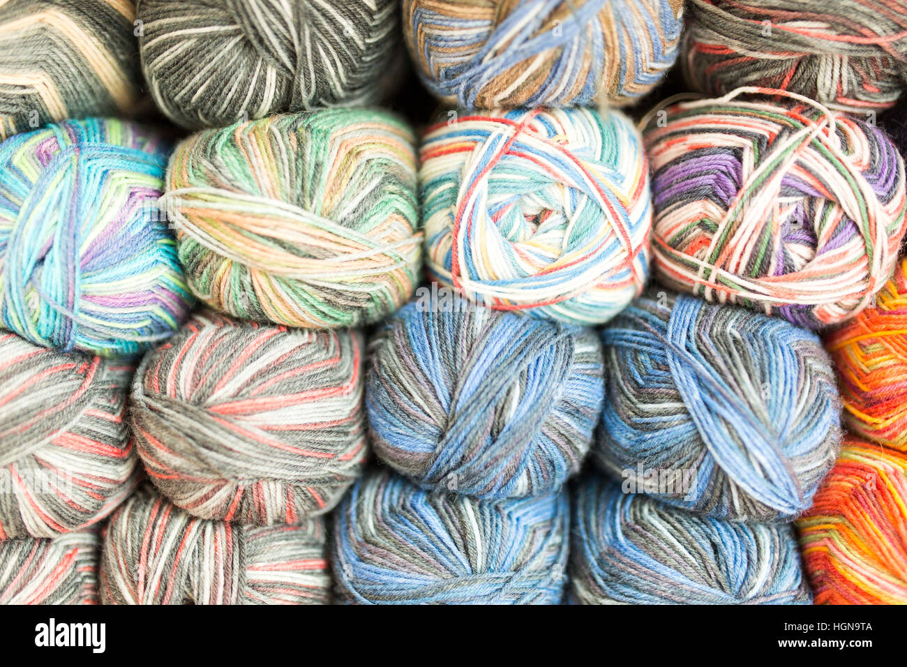 Knitting - balls of wool on a shelf Stock Photo