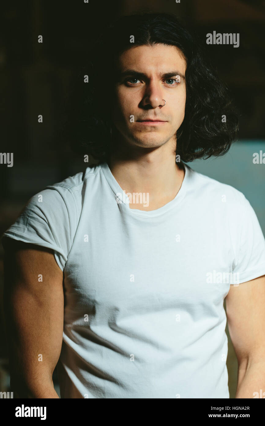 Brutal Guy With Long Hair On A Dark Background Stock Photo Alamy brutal-guy-with-long-hair-on-a-dark-background-stock-photo-alamy