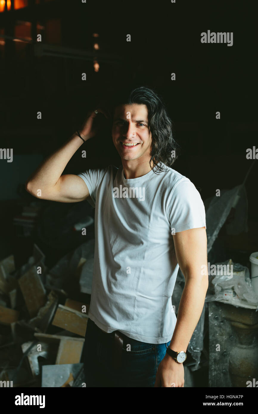 Beautiful Long Haired Brunette Guy In White T Shirts Stock Photo Alamy